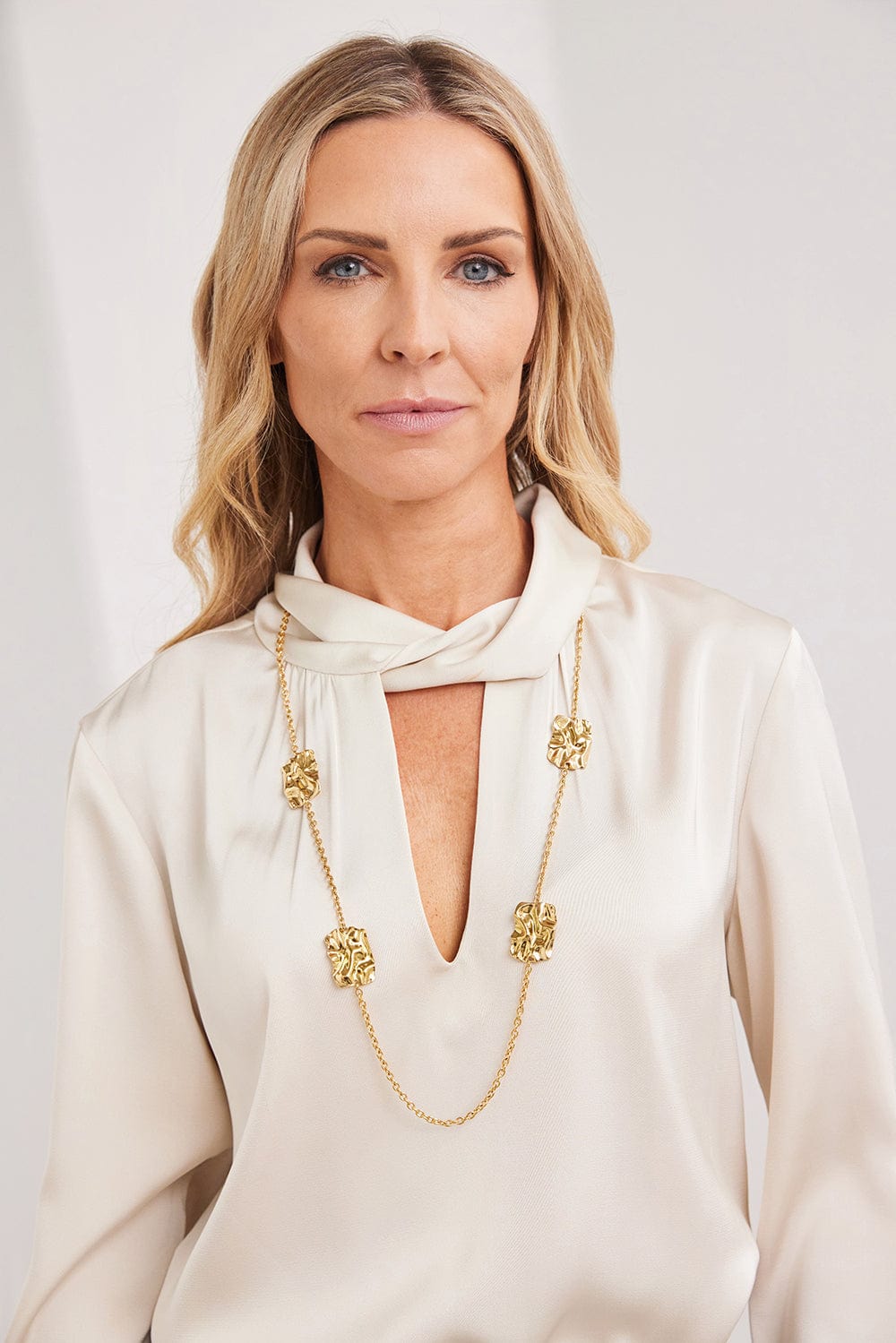 PERUZZI Long Sleeve Twist Neck Blouse