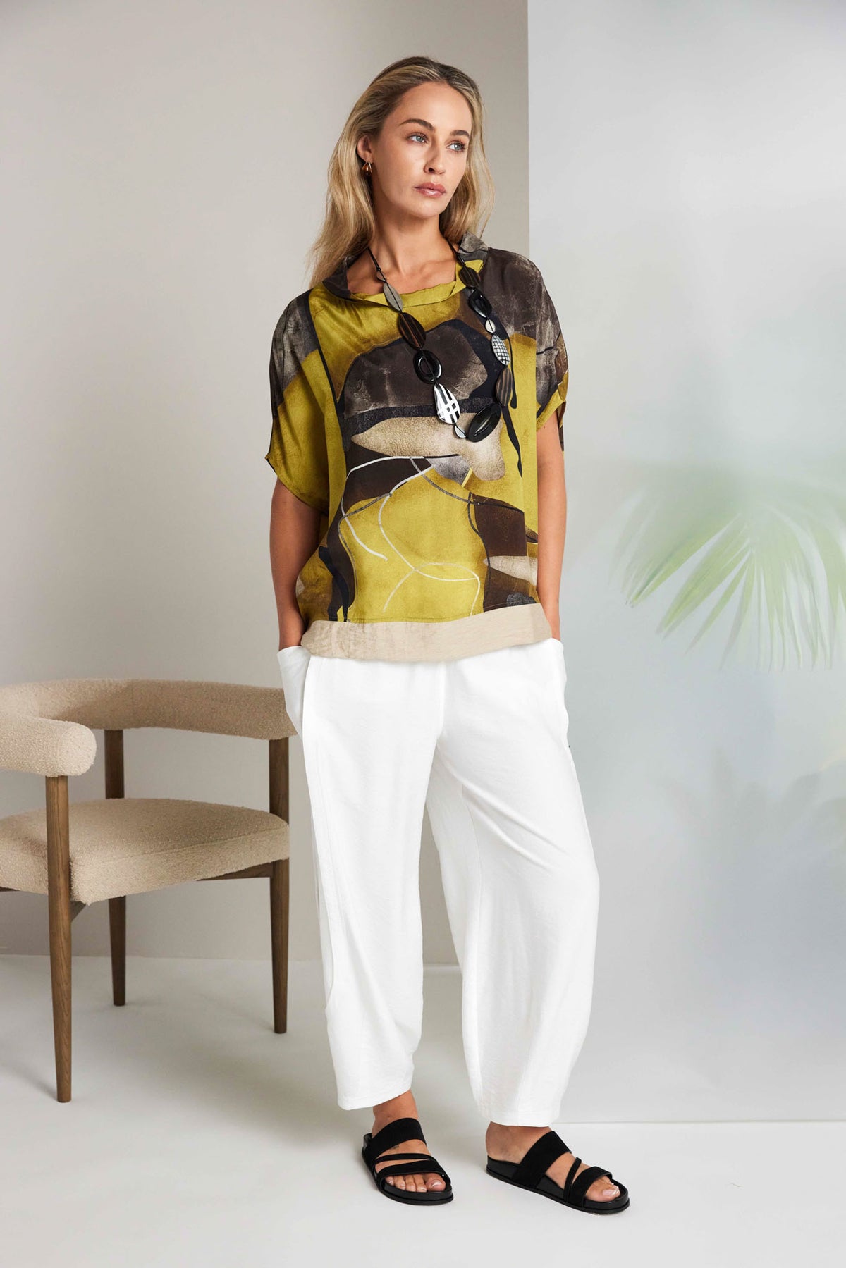 NAYA Dipped Hem Blouse