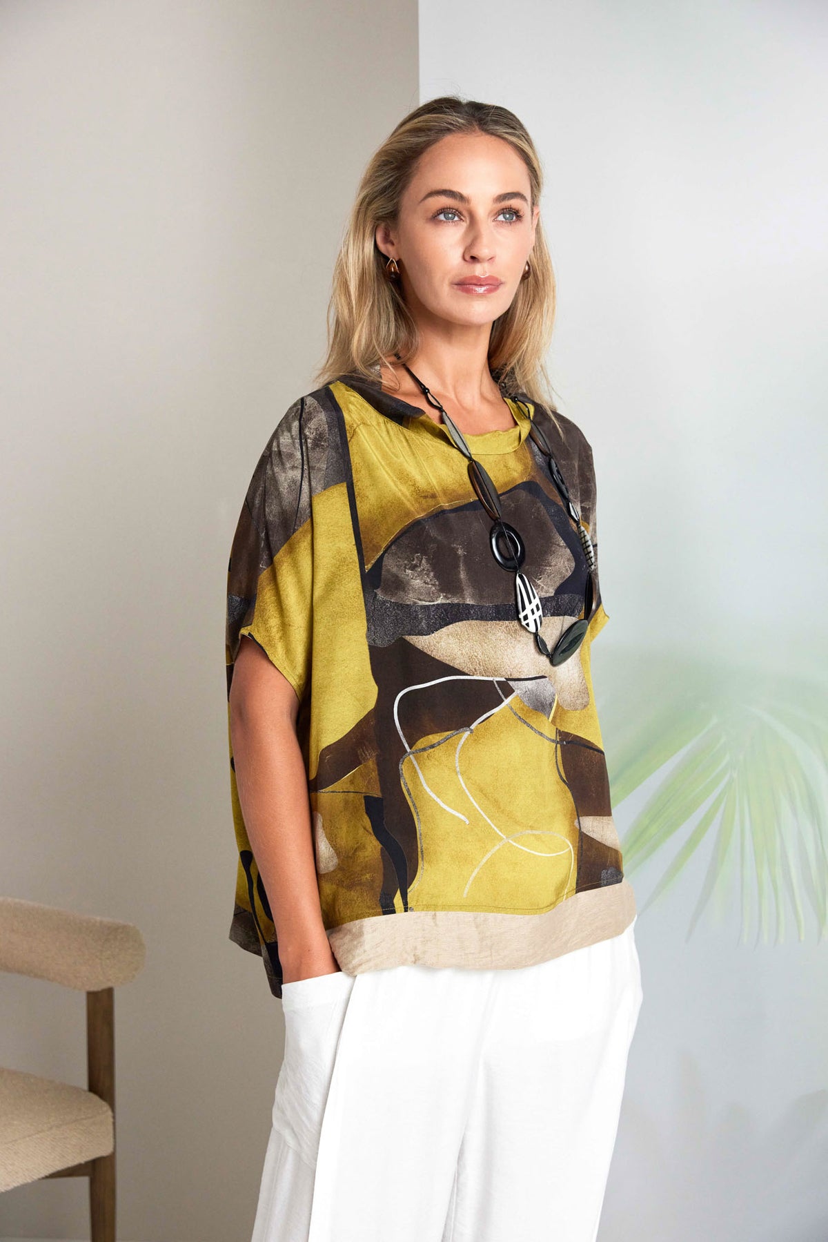 NAYA Dipped Hem Blouse