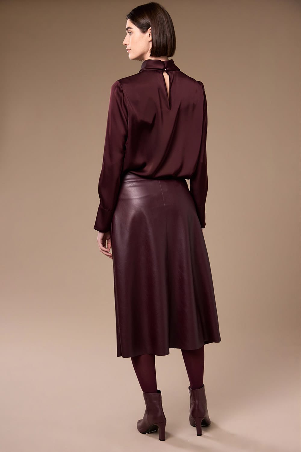 Peruzzi Long Sleeve Twist Top